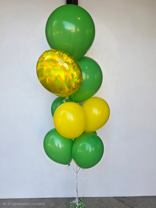 Bouquet of green and yellow balloons against a white background