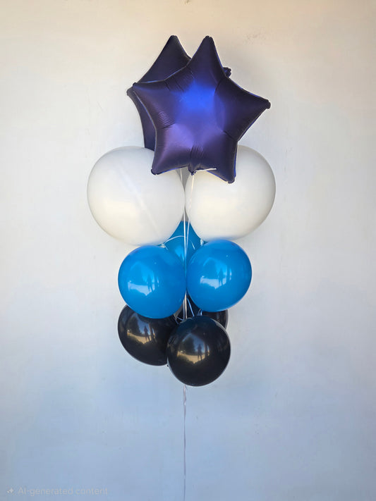 Balloon arrangement with blue, white, and black balloons on a plain background